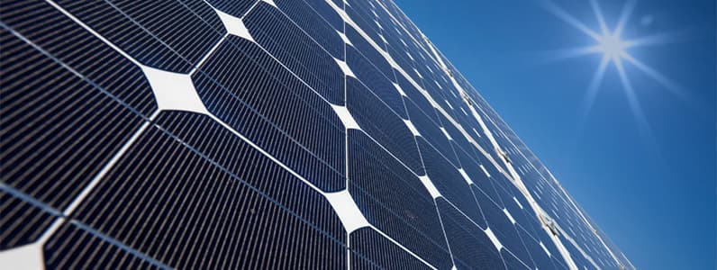 Solar PV array installation on a commercial roof in Ghana